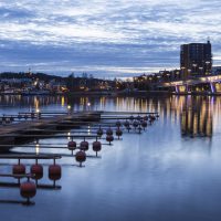 A bridge leading to the city with empty pier in front. Picture is taken in Jyv?skyl?, Finland.